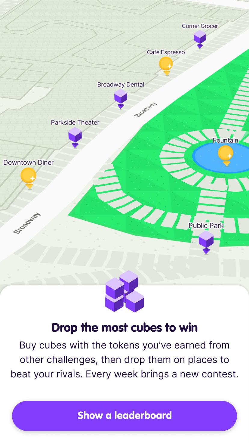 Screenshot from the app intro showing places the user has dropped cubes on the map and prompting the user to tap a button to Show a leaderboard.